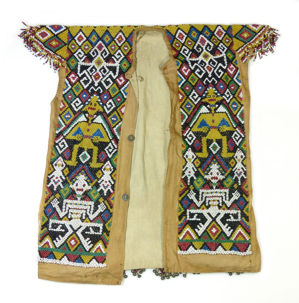 Front of a waistcoat like jacket, made of a European cotton fabric and glass beads that are arranged in a decorative pattern depicting human figures and lizards