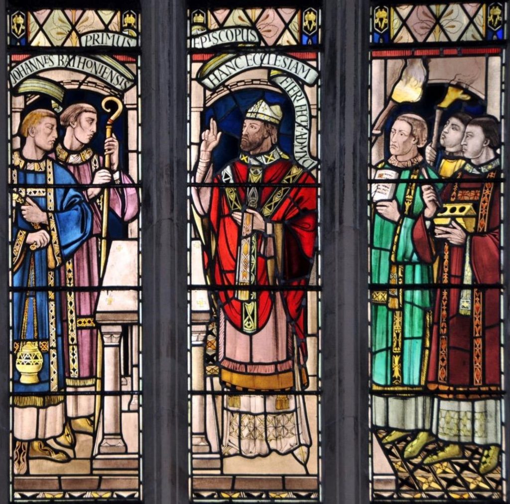 stained glass window featuring adelard of bath